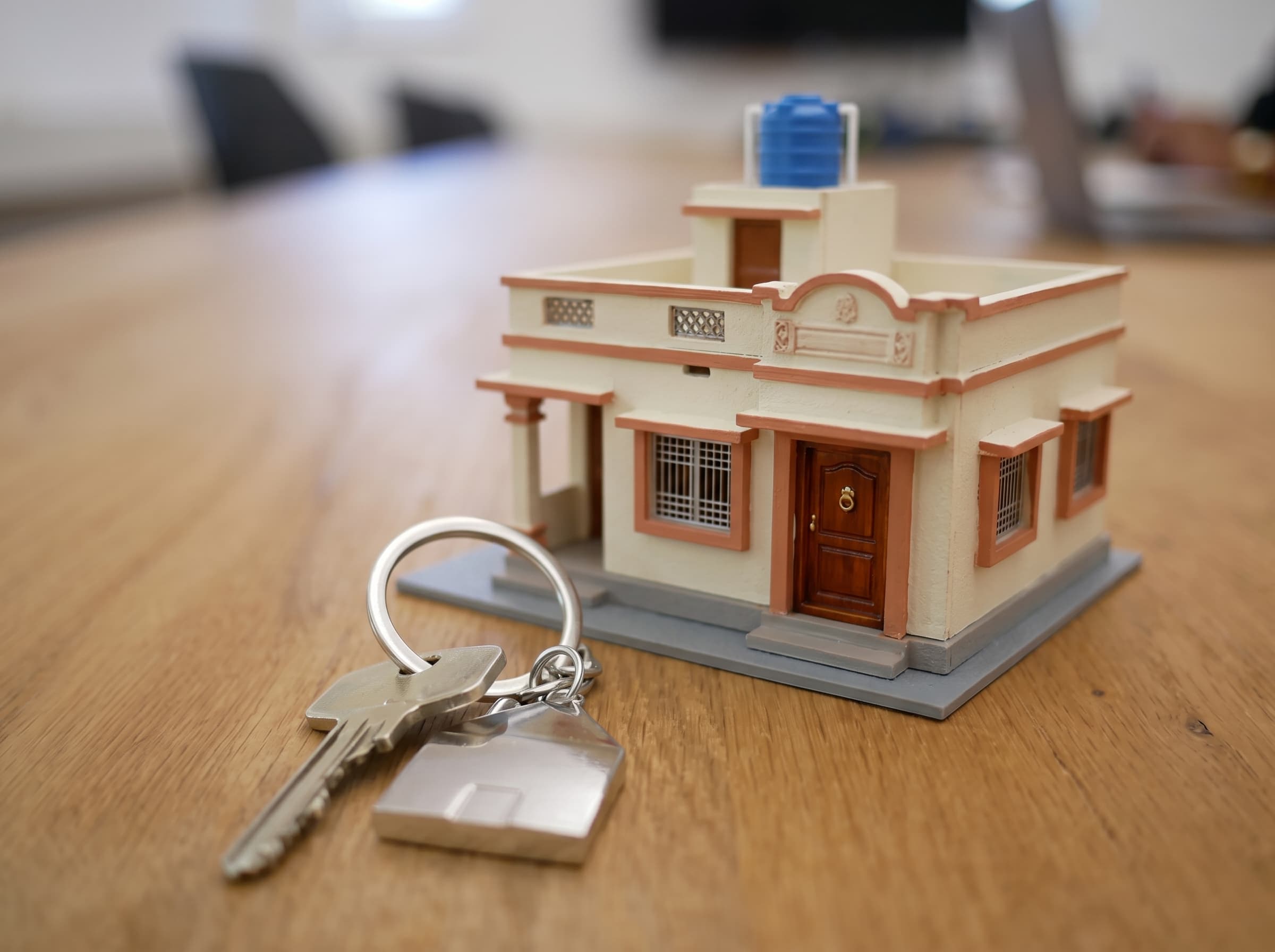 Model of an Indian house with keys ready for handover